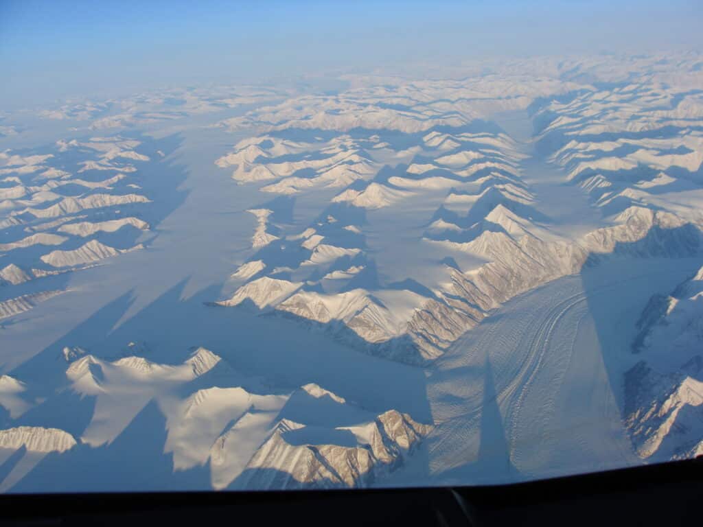 Snow-capped peaks and glaciers stretching to the horizon