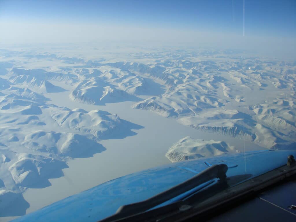 Snowy Greenland from the cockpit